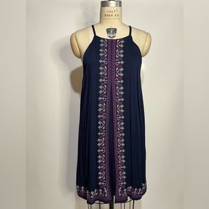 Ornately embroidered ‘skies are blue’ dress